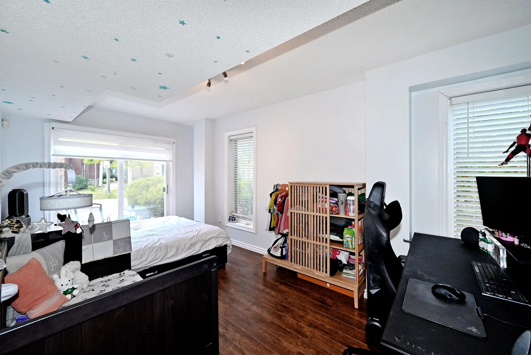 Ground-level bedroom with patio walkout