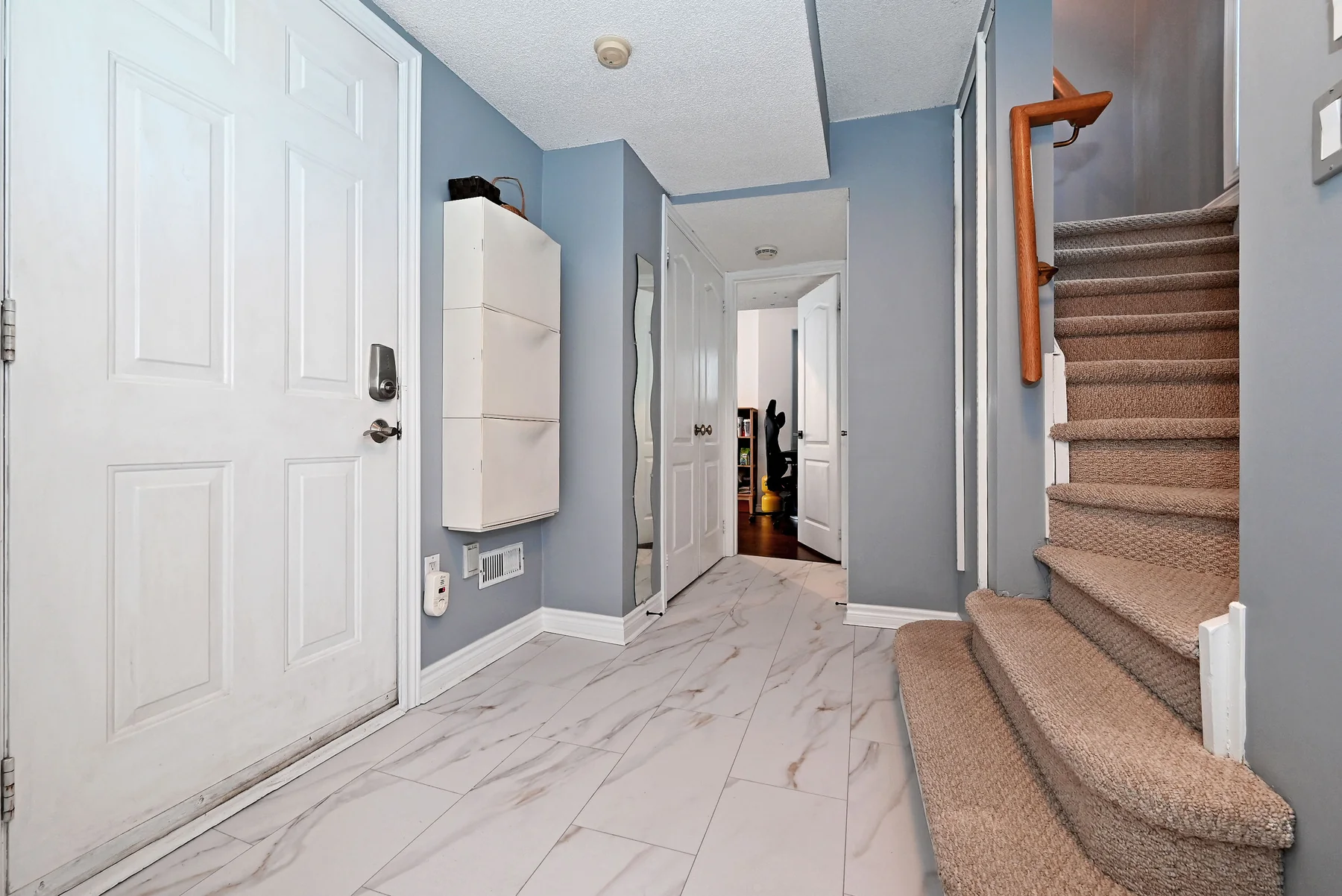 Freshly tiled ground-level foyer
