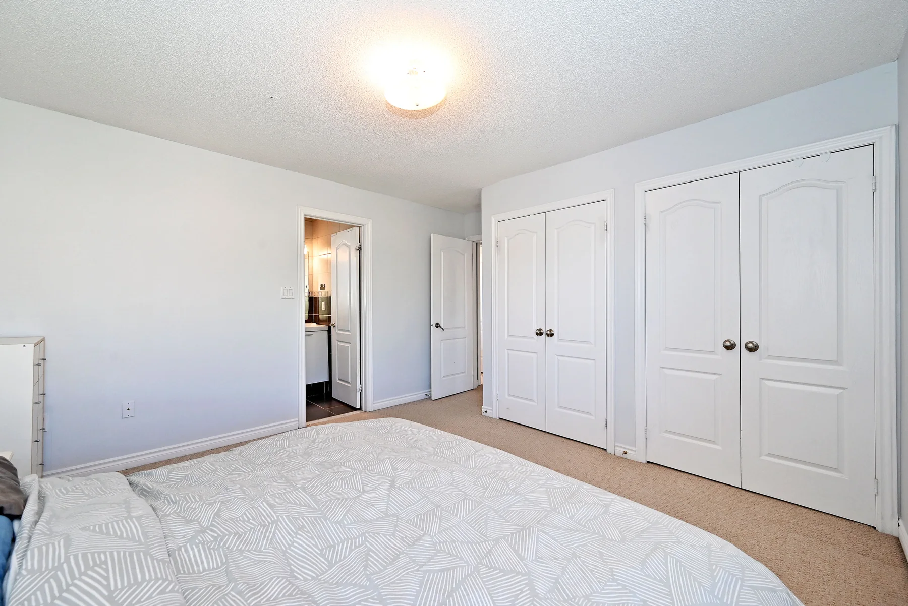 Primary bedroom closet wall